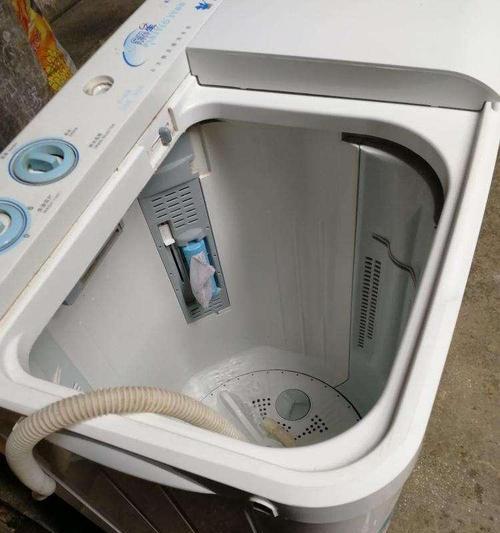 家用洗衣机嗡嗡响声的修理方法（解决家用洗衣机嗡嗡响声的实用技巧）
