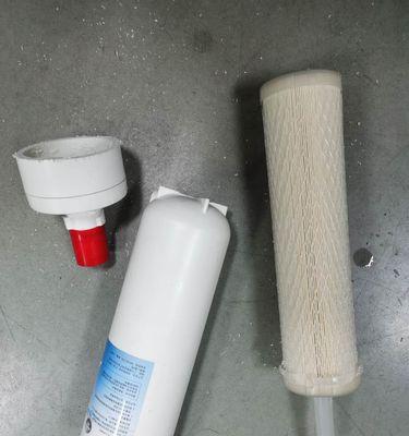 如何应对无法拧开净水器滤芯盖的问题（解决净水器滤芯拧不开盖的实用方法）