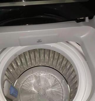 如何解决樱花洗衣机排水慢的问题（排水问题困扰）