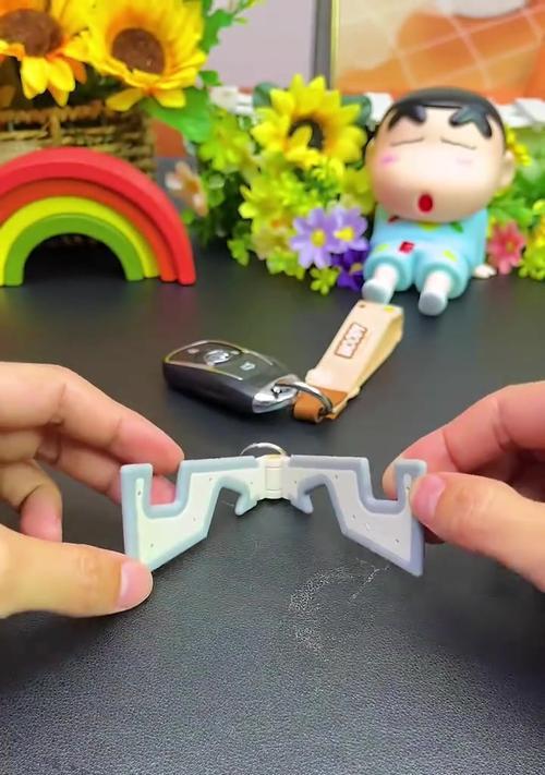如何用隔板制作手机支架？视频教程中有哪些关键步骤？