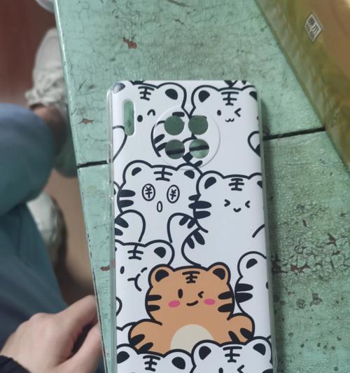 手机壳黑白挂件的安装方法是什么？如何选择合适的挂件？